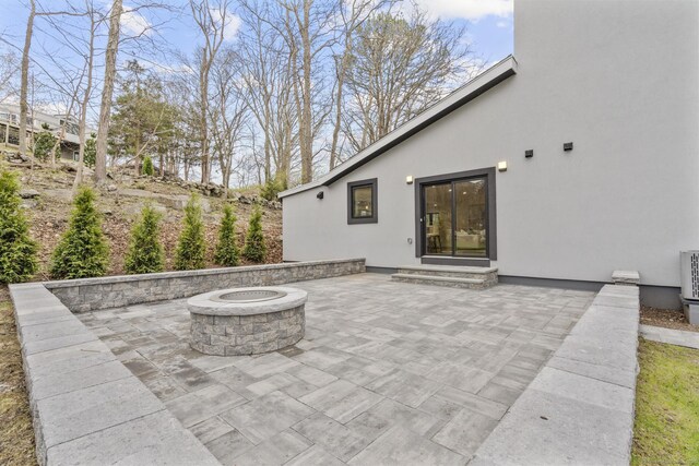 35 Bayberry Ln, Guilford, CT 06437 - view of patio / terrace with an outdoor fire pit