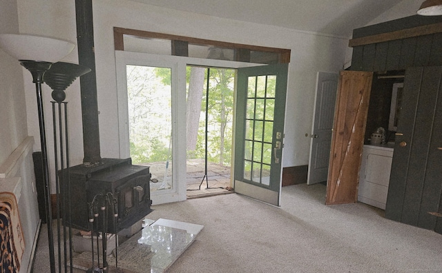12 Wells Rd, New Milford, CT 06776 - carpeted living room with washer / clothes dryer and a wood stove
