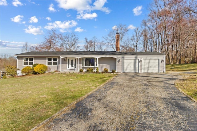 60 Oxen Hill Rd, Trumbull, CT 06611 - view of front facade featuring a front yard, an attached garage, and driveway