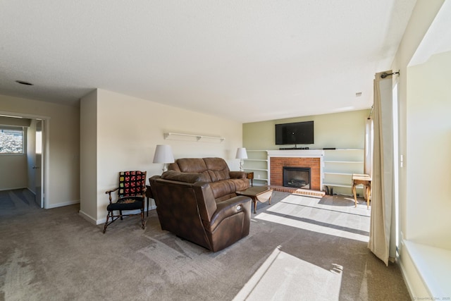 231 Heritage Vlg Unit C, Southbury, CT 06488 - living room with carpet flooring and a brick fireplace