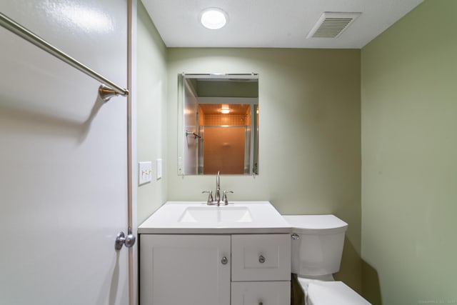 231 Heritage Vlg Unit C, Southbury, CT 06488 - bathroom featuring toilet and vanity