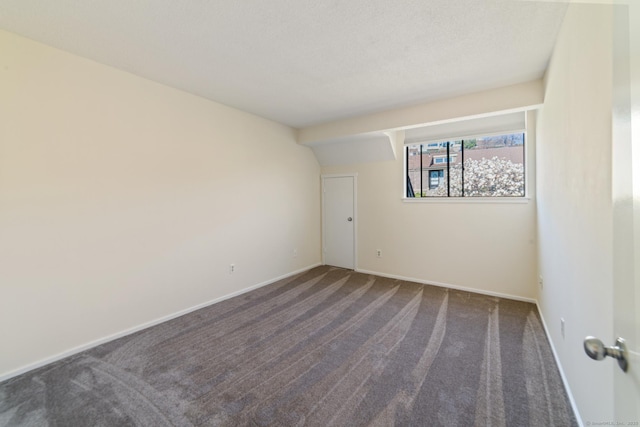 231 Heritage Vlg Unit C, Southbury, CT 06488 - unfurnished room with carpet floors and baseboards