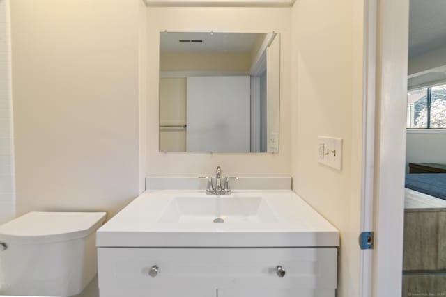 231 Heritage Vlg Unit C, Southbury, CT 06488 - bathroom with vanity and toilet
