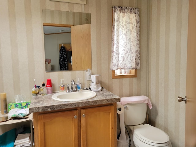 15 Circle Dr, Stonington, CT 06378 - bathroom with toilet, wallpapered walls, and vanity