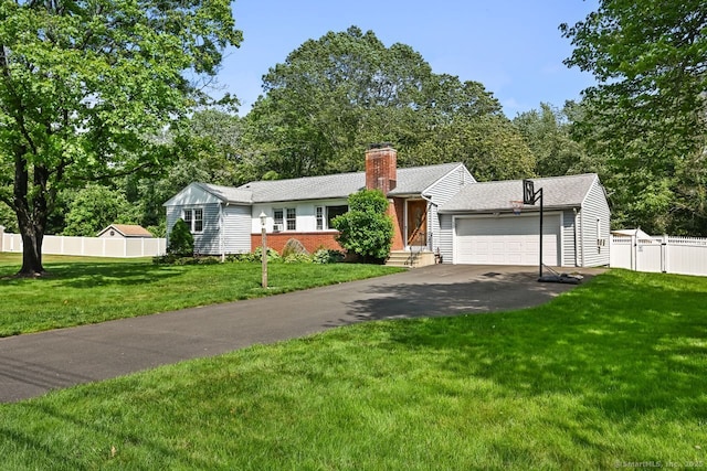 447 Howellton Rd, Orange, CT 06477 - single story home featuring driveway, an attached garage, a chimney, and brick siding