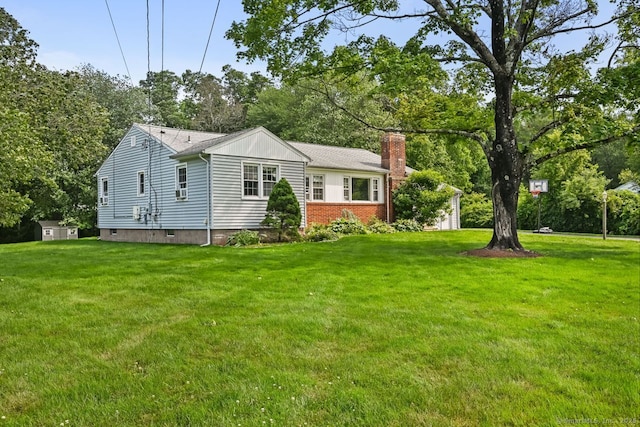 447 Howellton Rd, Orange, CT 06477 - view of front of property with a chimney, a front yard, and view of scattered trees