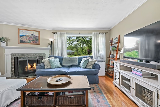 447 Howellton Rd, Orange, CT 06477 - living area featuring ornamental molding, a fireplace, and wood finished floors