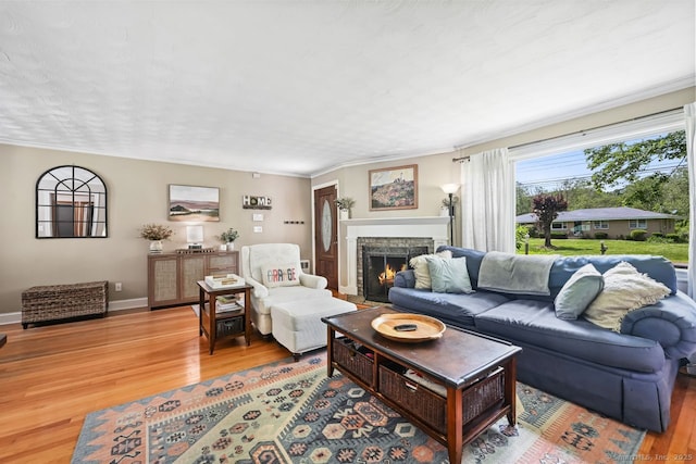 447 Howellton Rd, Orange, CT 06477 - living area featuring light wood-style flooring and a fireplace
