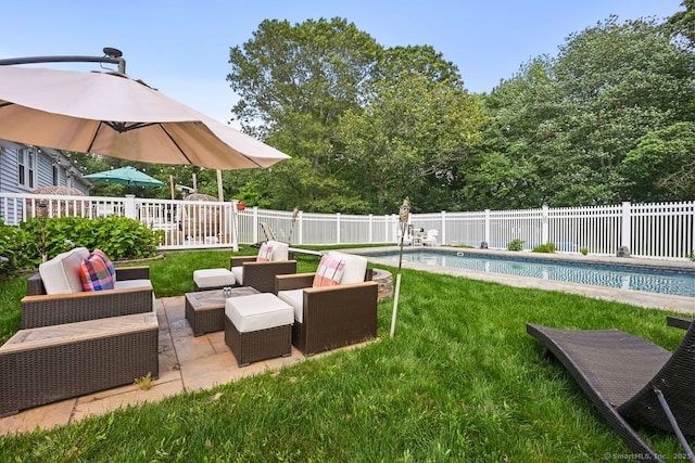 447 Howellton Rd, Orange, CT 06477 - fenced backyard with outdoor lounge area and a patio area