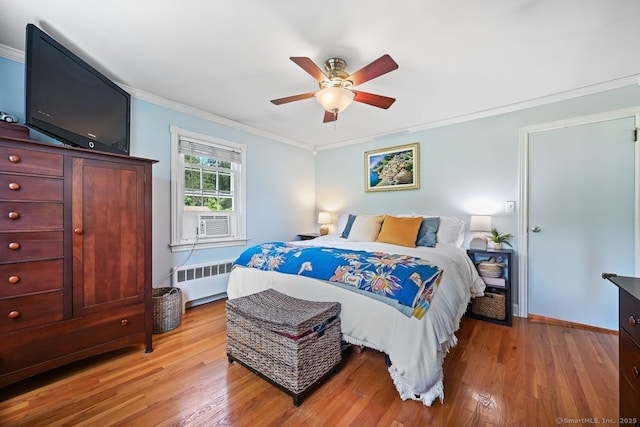 447 Howellton Rd, Orange, CT 06477 - bedroom with radiator, crown molding, light wood finished floors, cooling unit, and ceiling fan