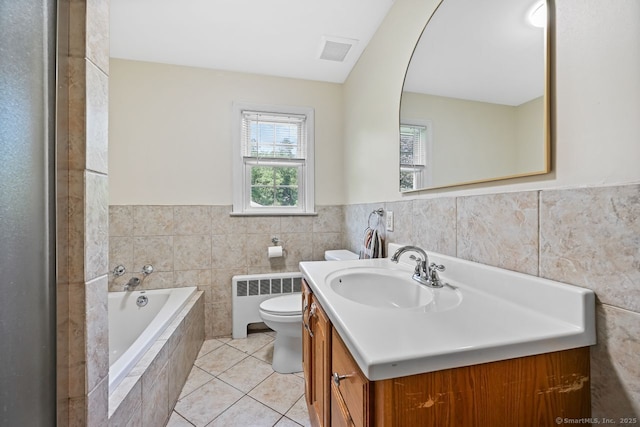 447 Howellton Rd, Orange, CT 06477 - full bath featuring radiator, a bath, vanity, tile patterned floors, and tile walls
