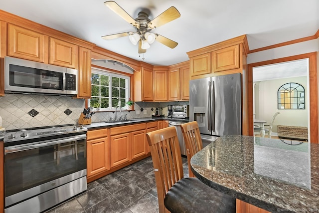 447 Howellton Rd, Orange, CT 06477 - kitchen featuring appliances with stainless steel finishes, a ceiling fan, tasteful backsplash, and dark stone countertops