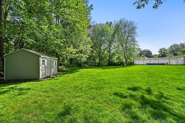 447 Howellton Rd, Orange, CT 06477 - view of yard featuring a storage shed