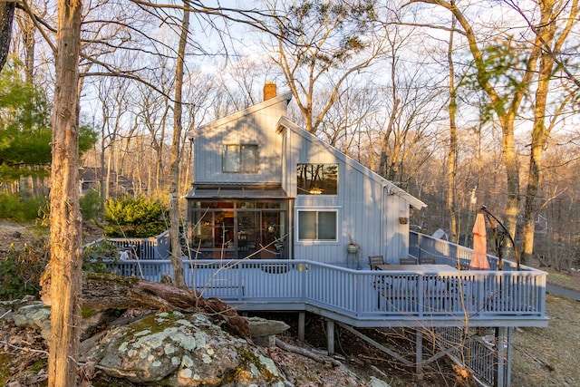 259 Weatherly Trl, Guilford, CT 06437 - back of house with a wooden deck and a chimney