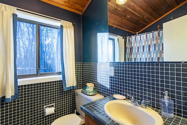 259 Weatherly Trl, Guilford, CT 06437 - bathroom featuring a wealth of natural light, wooden ceiling, lofted ceiling, and tile walls