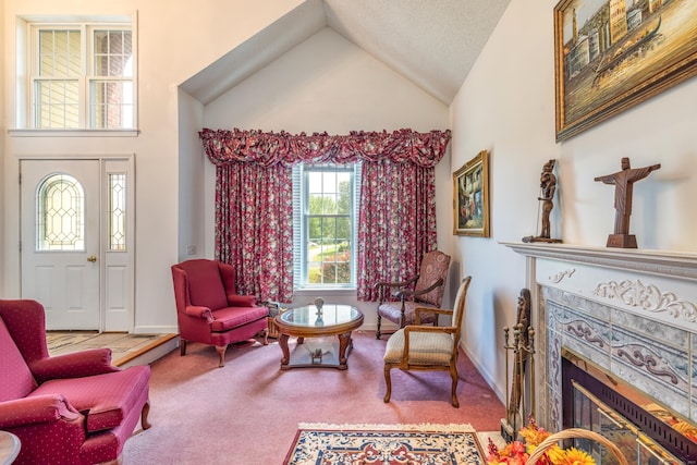 14 Fieldstone Dr, Mansfield, CT 06268 - living area with carpet flooring, a fireplace, and high vaulted ceiling