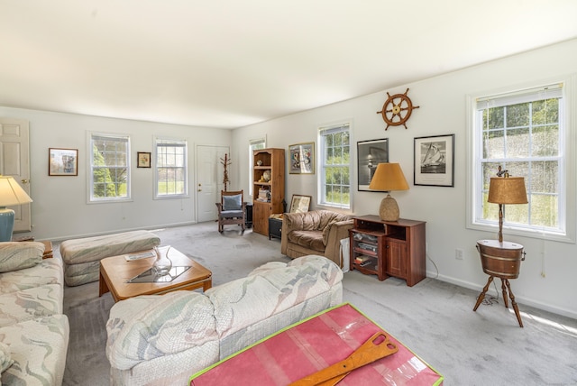 14 Fieldstone Dr, Mansfield, CT 06268 - living area with plenty of natural light and light colored carpet