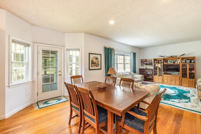 14 Fieldstone Dr, Mansfield, CT 06268 - dining area with a textured ceiling, light wood-type flooring, and recessed lighting