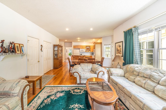 14 Fieldstone Dr, Mansfield, CT 06268 - living room featuring light wood-style flooring and recessed lighting