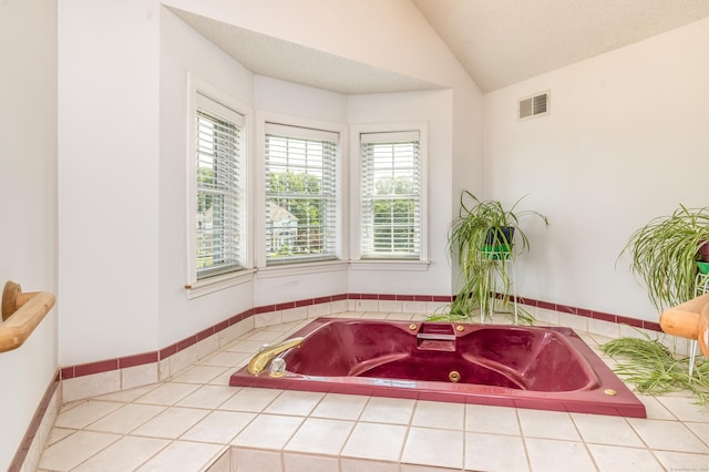 14 Fieldstone Dr, Mansfield, CT 06268 - full bathroom with a tub with jets and lofted ceiling