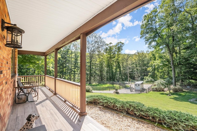 wooden deck with a yard