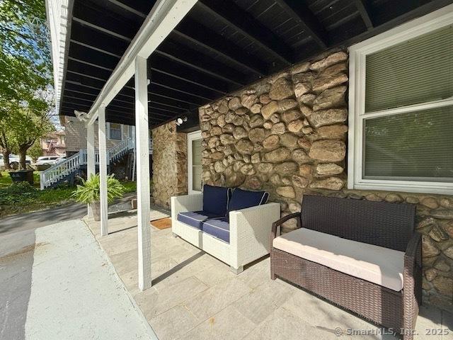 view of patio with an outdoor living space