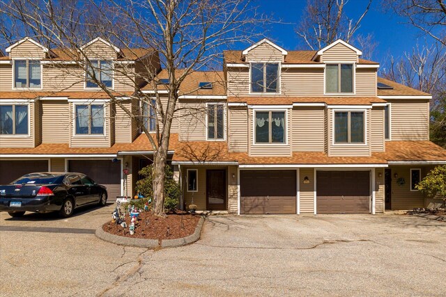 13 Westside Dr # 93, Thompson, CT 06255 - view of property with a garage and driveway