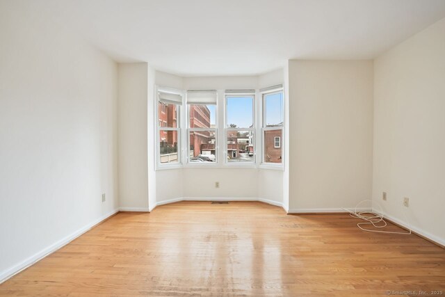 95 Audubon St Unit 222Aka 24, New Haven, CT 06510 - unfurnished room featuring light wood finished floors and baseboards