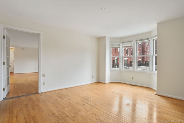 95 Audubon St Unit 222Aka 24, New Haven, CT 06510 - spare room featuring light wood finished floors, baseboards, and visible vents