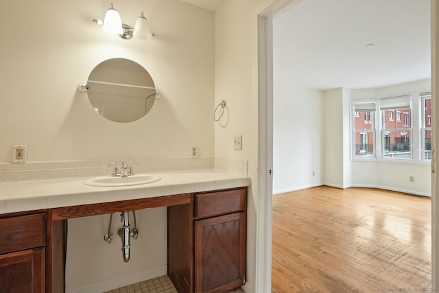 95 Audubon St Unit 222Aka 24, New Haven, CT 06510 - bathroom featuring baseboards, vanity, and wood finished floors