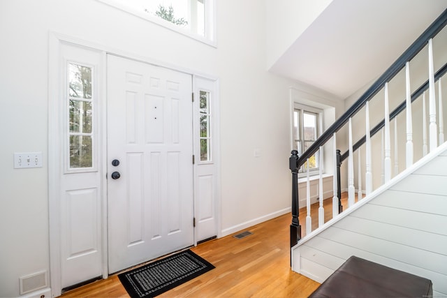 5A Big Buck Ln, Brookfield, CT 06804 - entryway featuring light wood finished floors, visible vents, and stairs