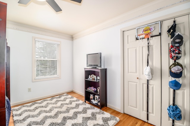 5A Big Buck Ln, Brookfield, CT 06804 - bedroom featuring ornamental molding, a closet, baseboards, and light wood-style floors