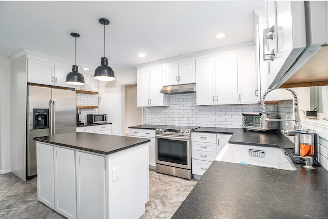5A Big Buck Ln, Brookfield, CT 06804 - kitchen with dark countertops, appliances with stainless steel finishes, under cabinet range hood, recessed lighting, and backsplash