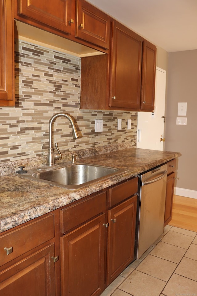 30 Woodland St Unit 5B, Hartford, CT 06105 - kitchen featuring a sink, backsplash, dishwasher, and light tile patterned floors