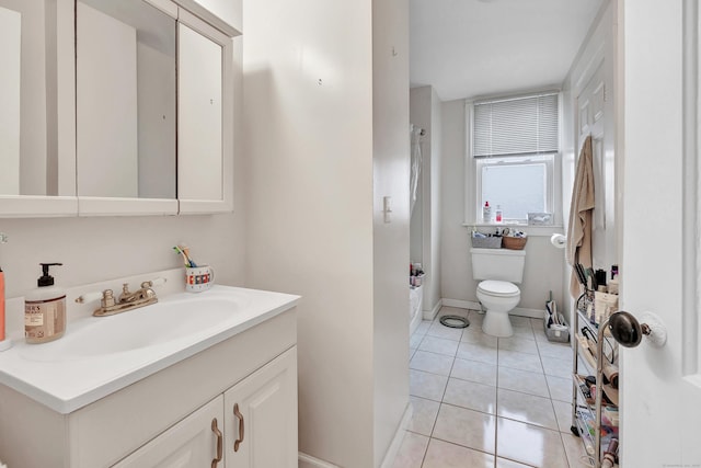 172 Prospect Ave, Shelton, CT 06484 - full bathroom with washtub / shower combination, vanity, baseboards, tile patterned flooring, and toilet