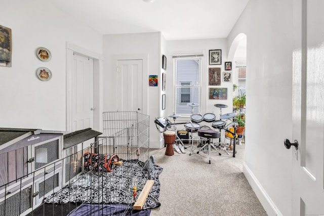 172 Prospect Ave, Shelton, CT 06484 - interior space with arched walkways, carpet flooring, and baseboards