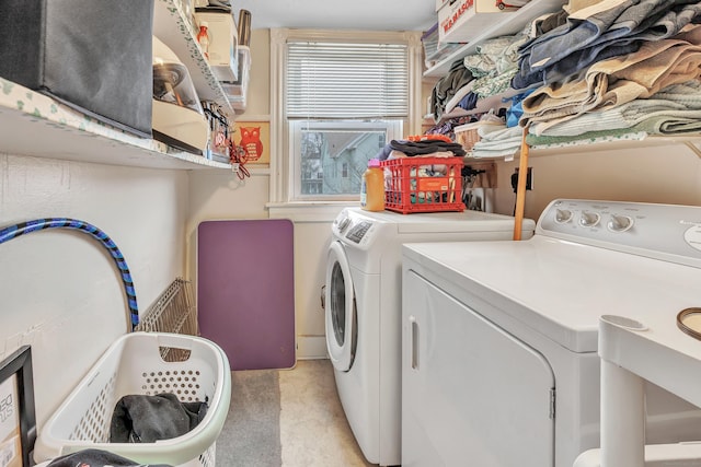 172 Prospect Ave, Shelton, CT 06484 - laundry area featuring light colored carpet, laundry area, and washing machine and clothes dryer