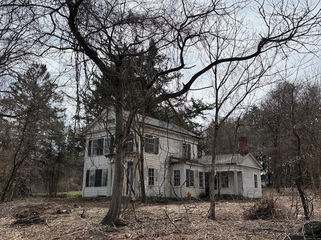 9 Winding Rd, Brookfield, CT 06804 - view of front facade featuring a chimney