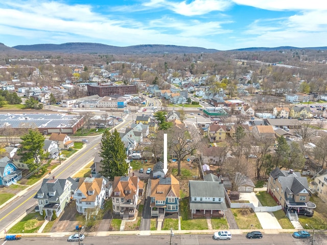 drone / aerial view with a residential view and a mountain view