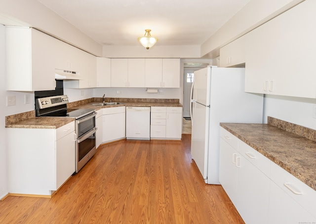 170 Barker Hill Dr, Guilford, CT 06437 - kitchen with white appliances, ventilation hood, light wood finished floors, and white cabinets