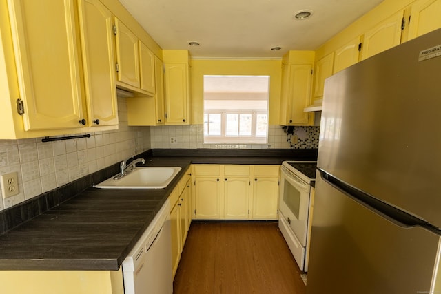 24 Echo Point Rd, Guilford, CT 06437 - kitchen with white appliances, dark countertops, dark wood-style flooring, and tasteful backsplash