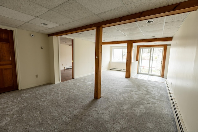 24 Echo Point Rd, Guilford, CT 06437 - spare room with a paneled ceiling, baseboard heating, carpet, and a baseboard radiator