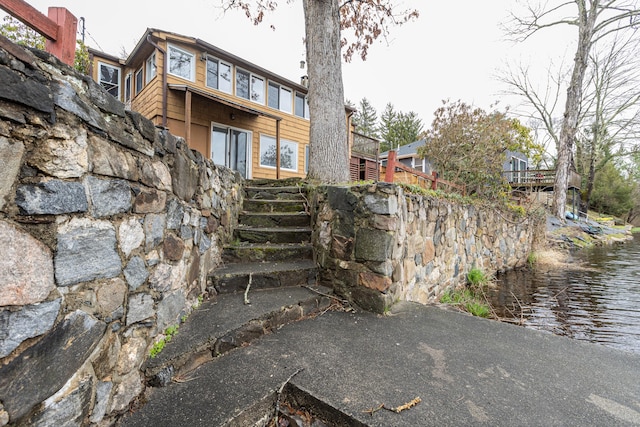 24 Echo Point Rd, Guilford, CT 06437 - back of house with a water view and stairway
