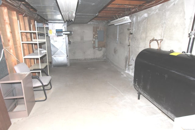 112 Paugassett Ln Unit 112, Shelton, CT 06484 - unfinished basement featuring heating fuel, electric panel, and heating unit