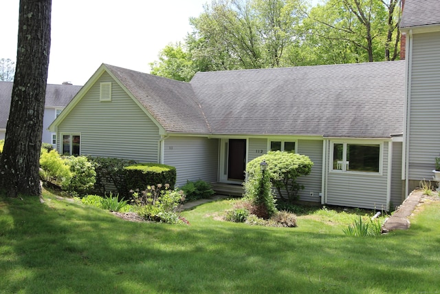 112 Paugassett Ln Unit 112, Shelton, CT 06484 - view of front of house featuring a front yard and a shingled roof