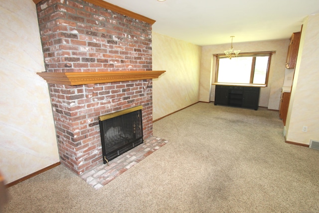 112 Paugassett Ln Unit 112, Shelton, CT 06484 - unfurnished living room with a fireplace, carpet floors, and baseboards