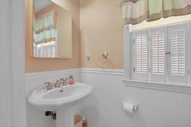 bathroom featuring wainscoting