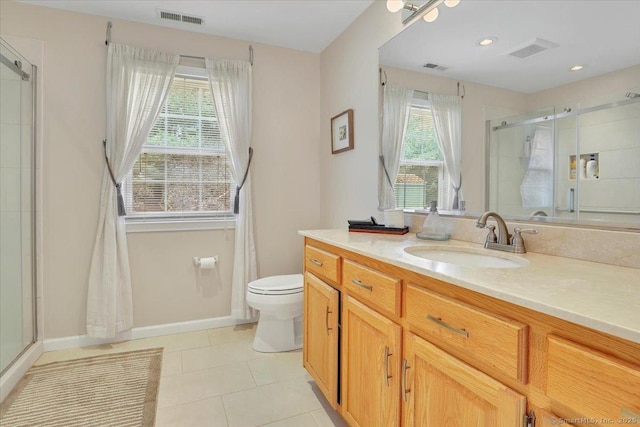 bathroom featuring tile patterned flooring, visible vents, and a stall shower