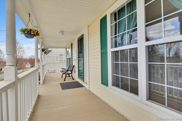 balcony featuring a porch