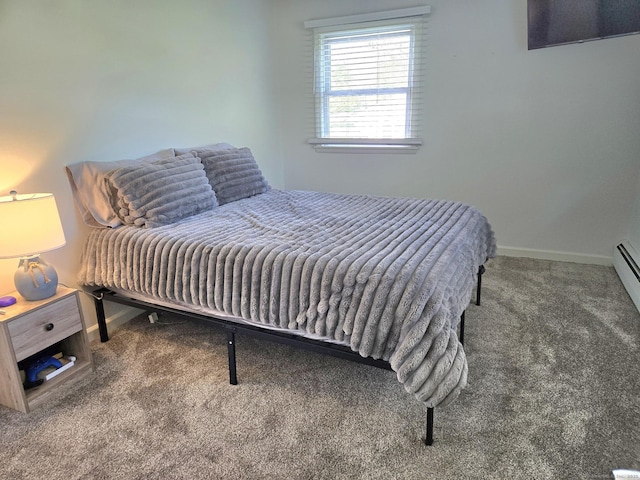 bedroom featuring baseboards and carpet flooring